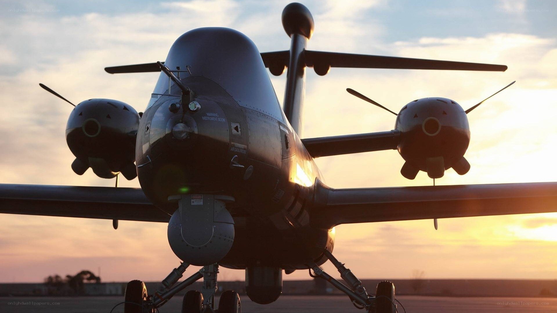 military drone at sunset