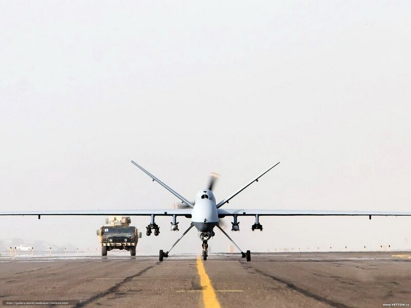 Military Drone on Runway — Gray, Dramatic