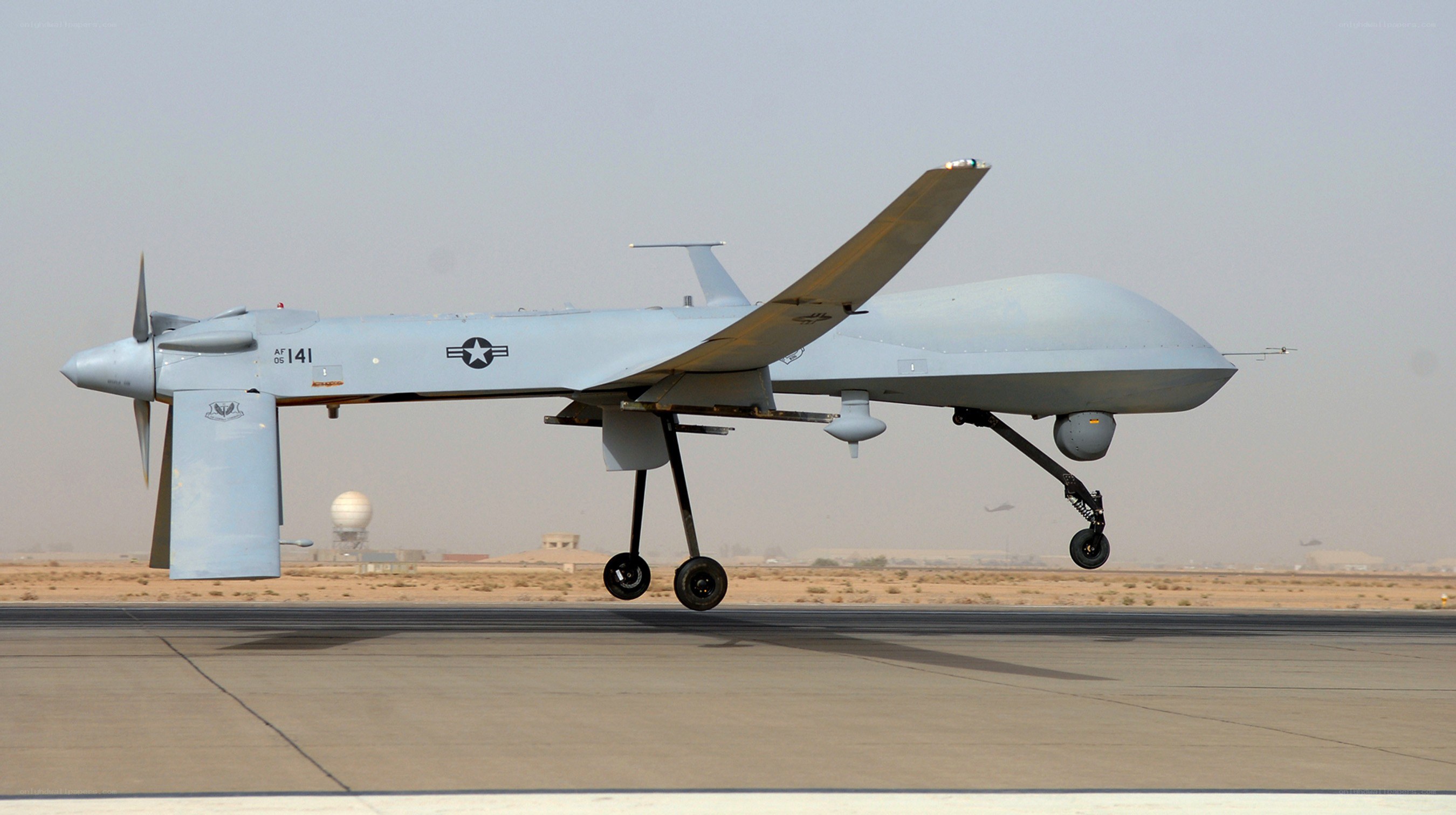 Military drone on runway