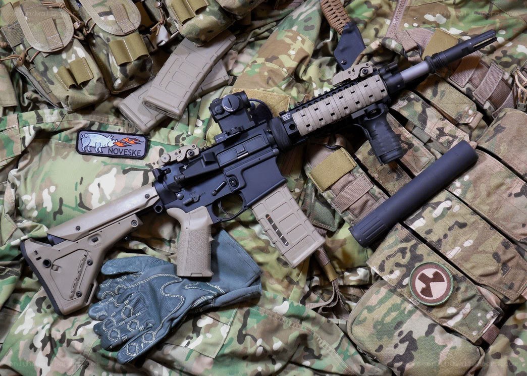 Military gear and rifle setup