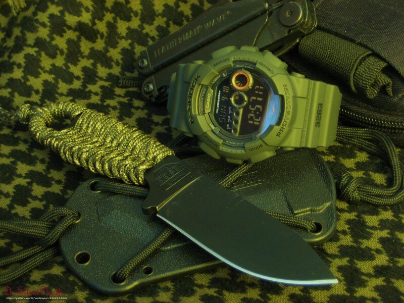 Military gear on camouflage