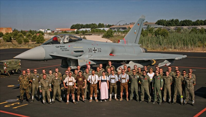 Military group with fighter jet