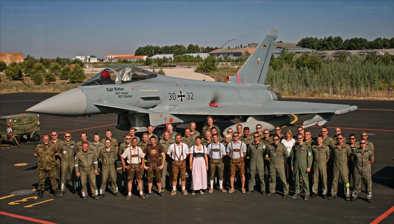 Military group with fighter jet