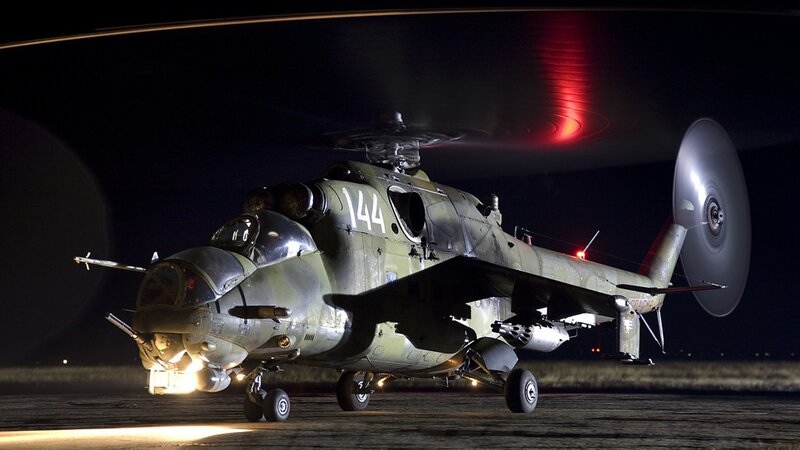 Military helicopter at night