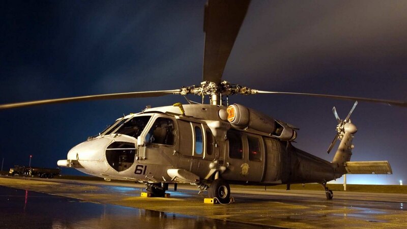 Military helicopter at night