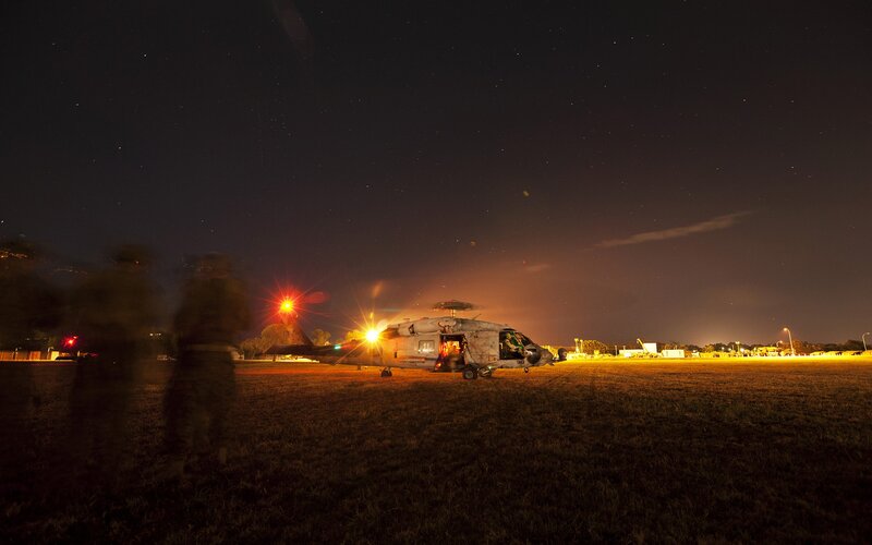 Military helicopter at night