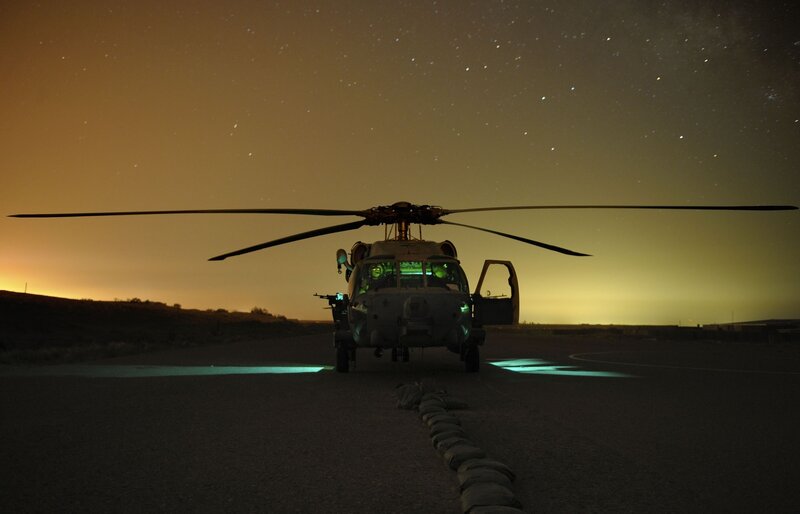 Military helicopter at night