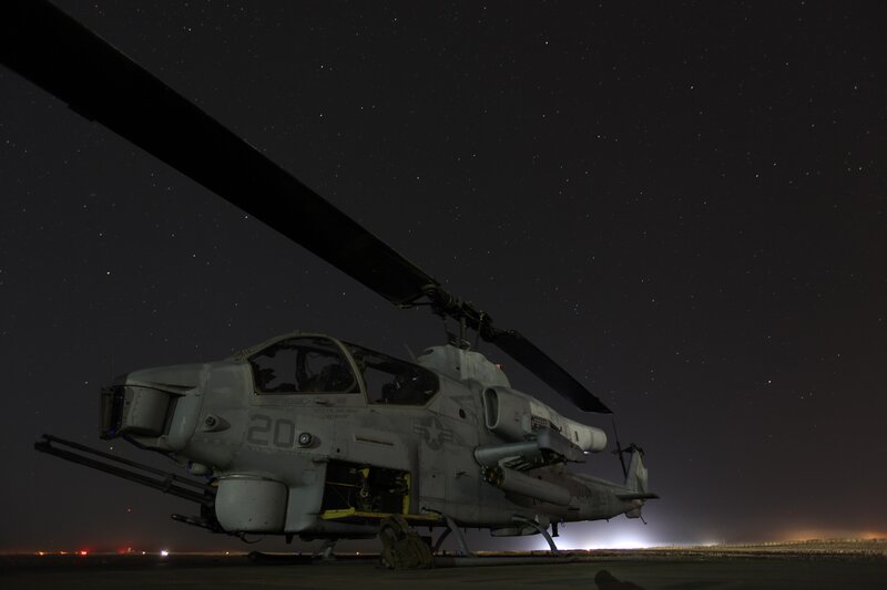 Military Helicopter at Night — Gray, Dramatic, Photograph