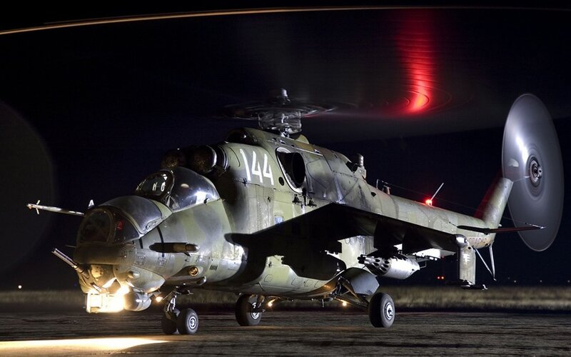 Military Helicopter at Night — Green