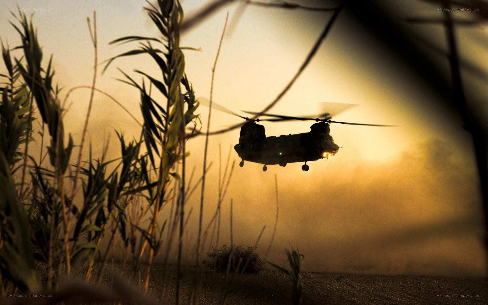 Military helicopter at sunset