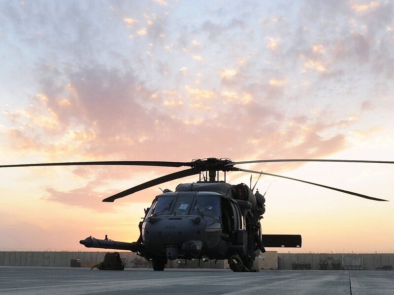 Military helicopter at sunset