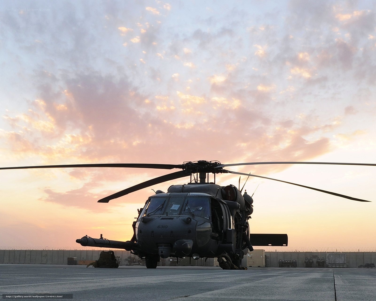 Military helicopter at sunset