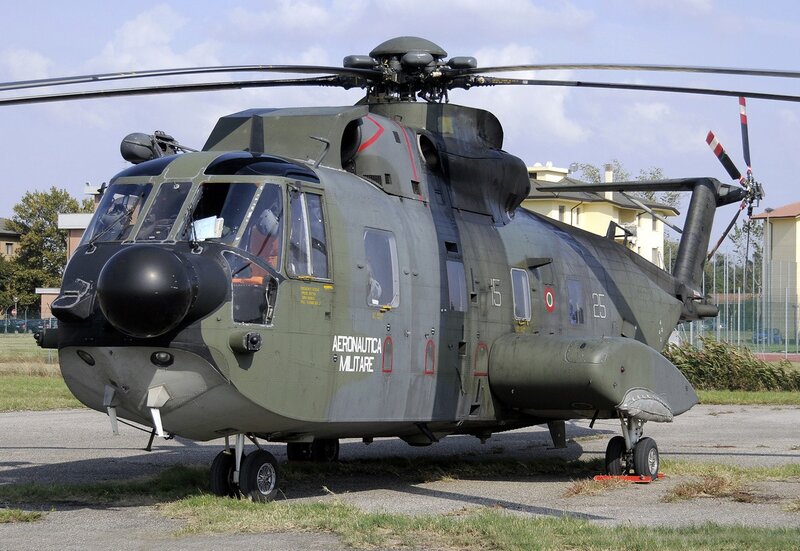 Military Helicopter — Green, Neutral, Afternoon, Photograph, Building