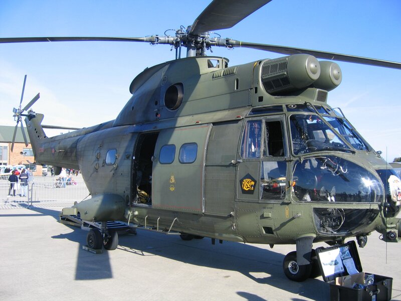 Military Helicopter — Green, Neutral, Afternoon, Photograph, People