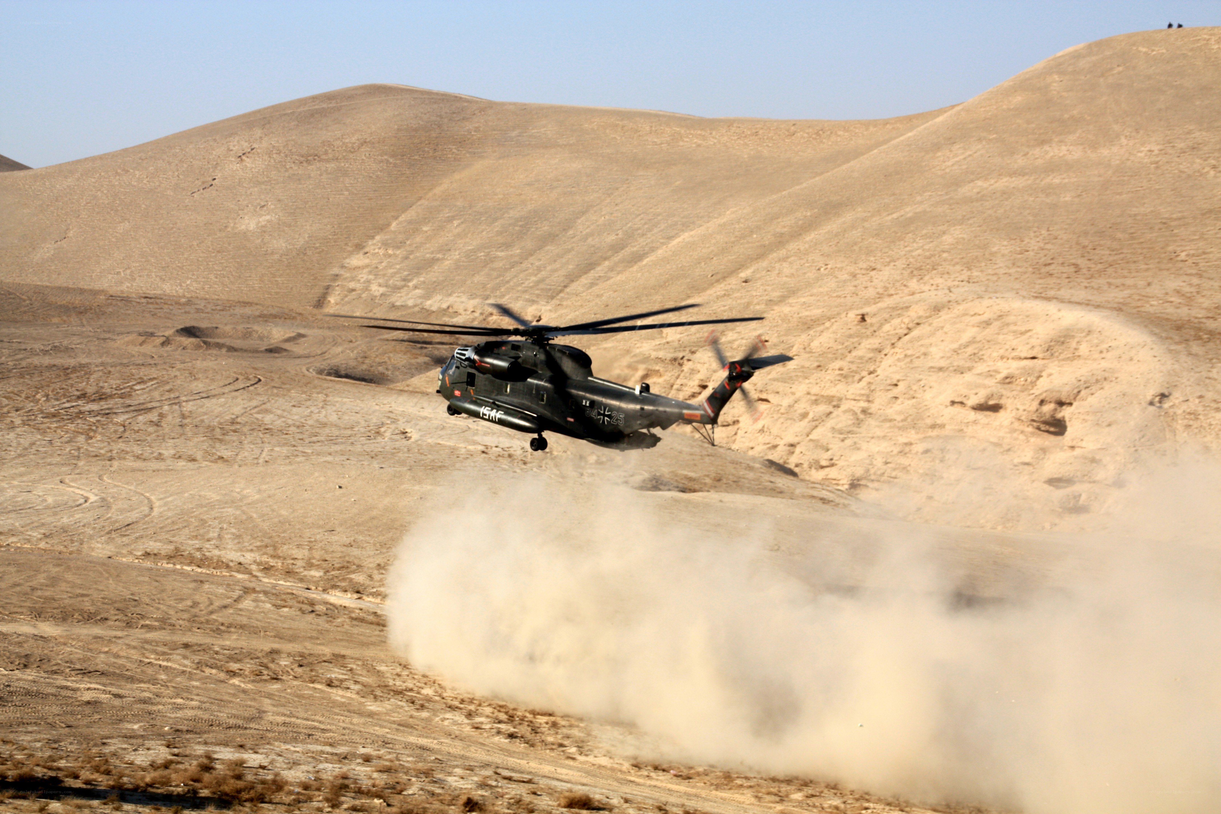 Military helicopter in desert