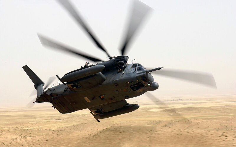 military helicopter in desert