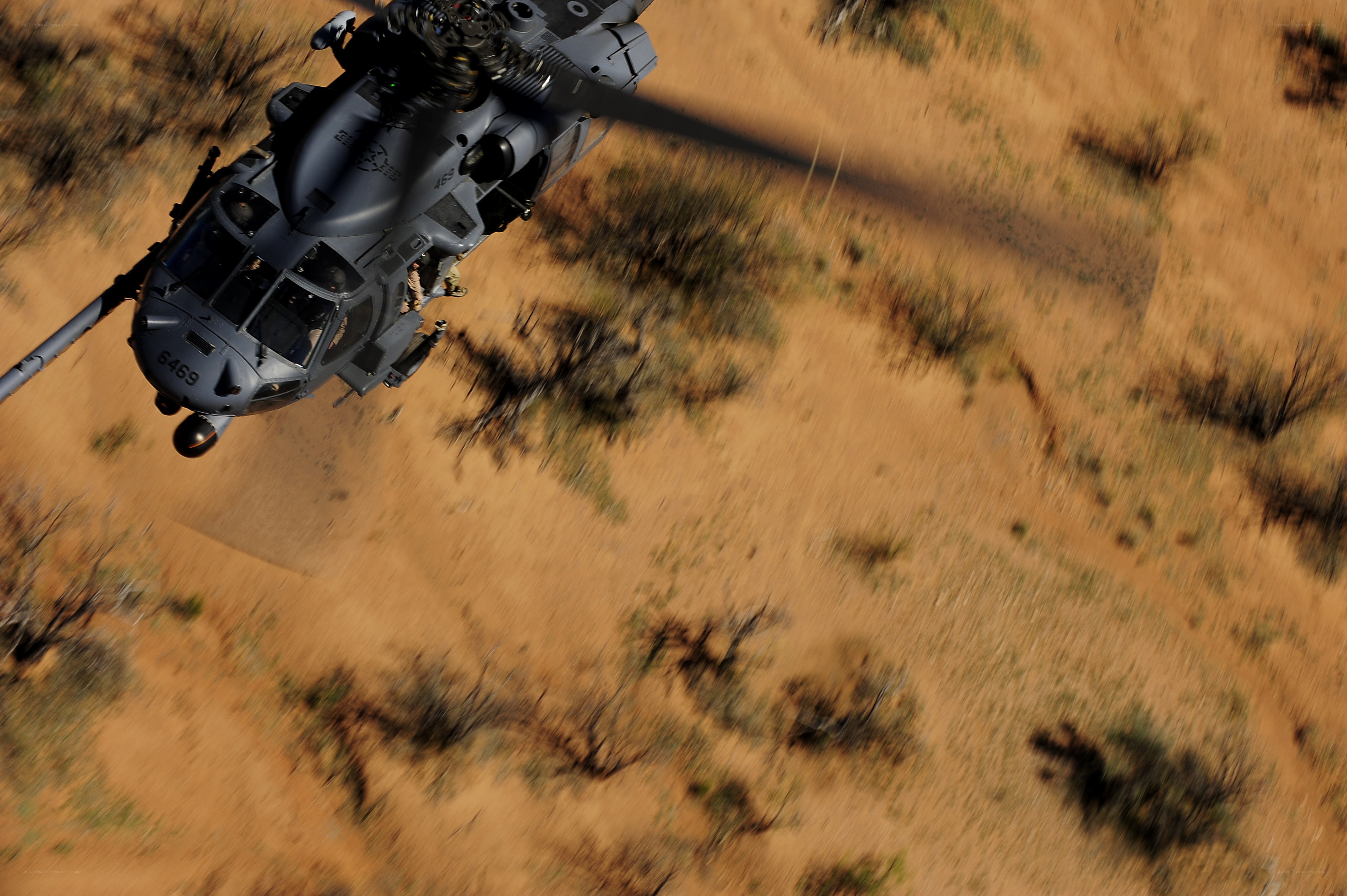 Military helicopter in desert