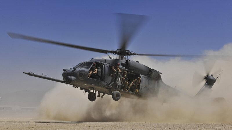 Military helicopter in desert
