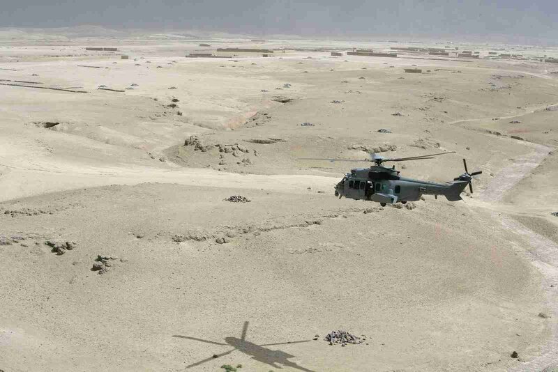 Military Helicopter in Desert — Brown, Arid