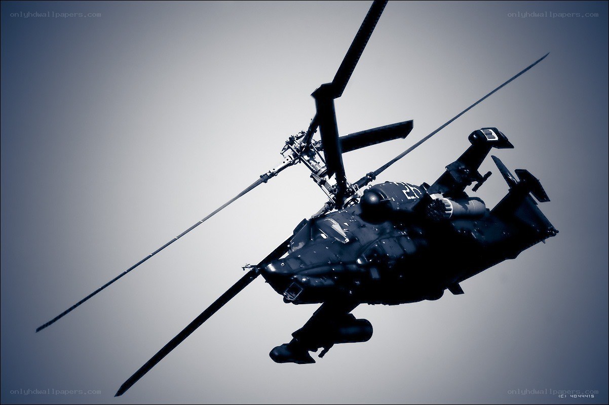 military helicopter in flight