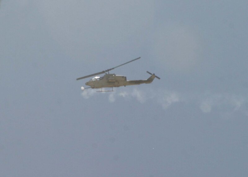 military helicopter in flight