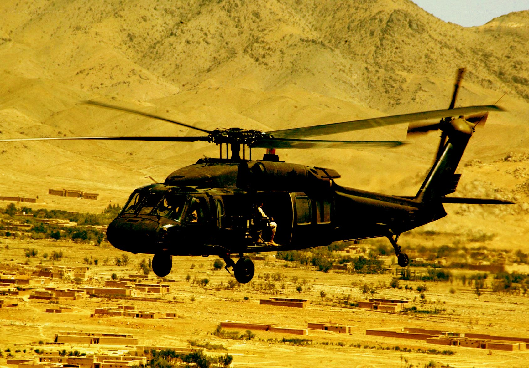 Military helicopter in flight