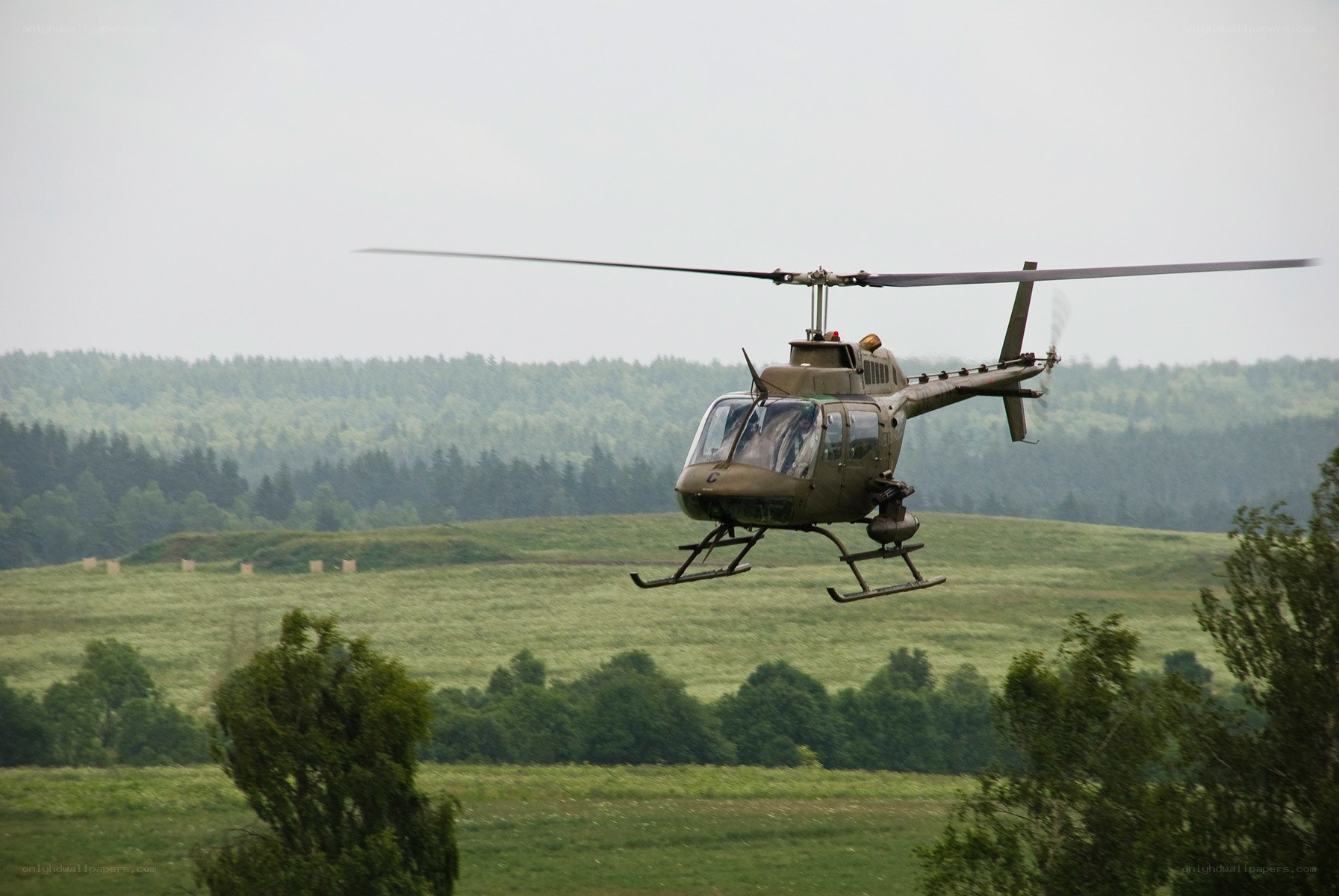 Military helicopter in flight