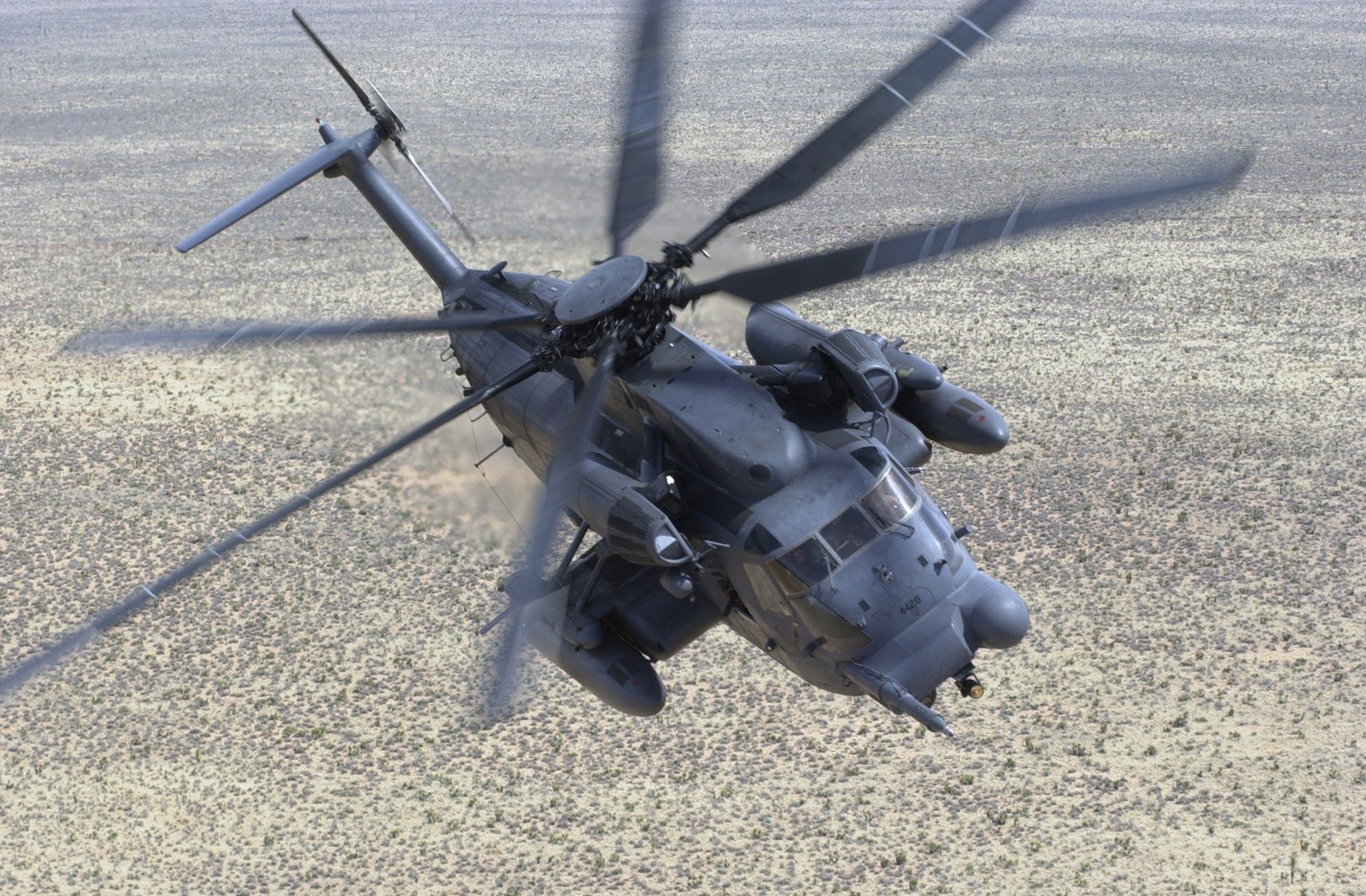 military helicopter in flight