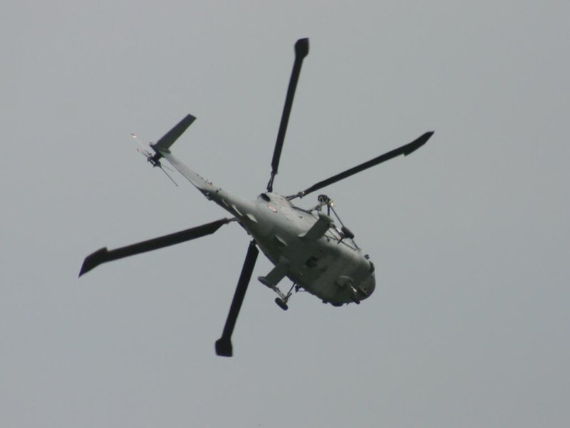 military helicopter in flight