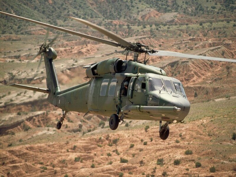 Military helicopter in flight