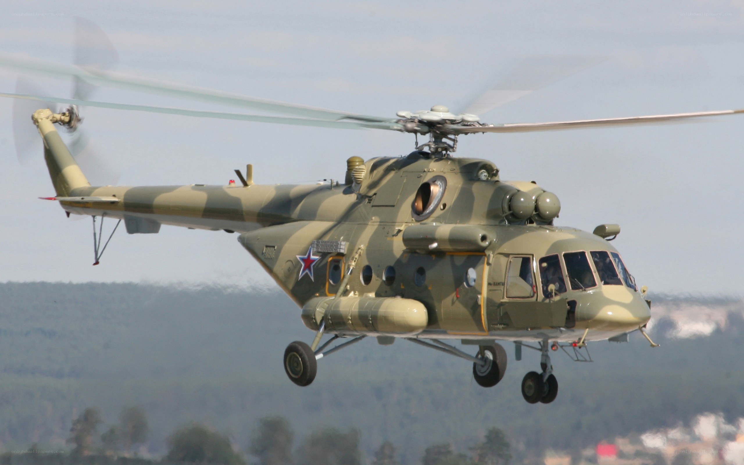 Military helicopter in flight