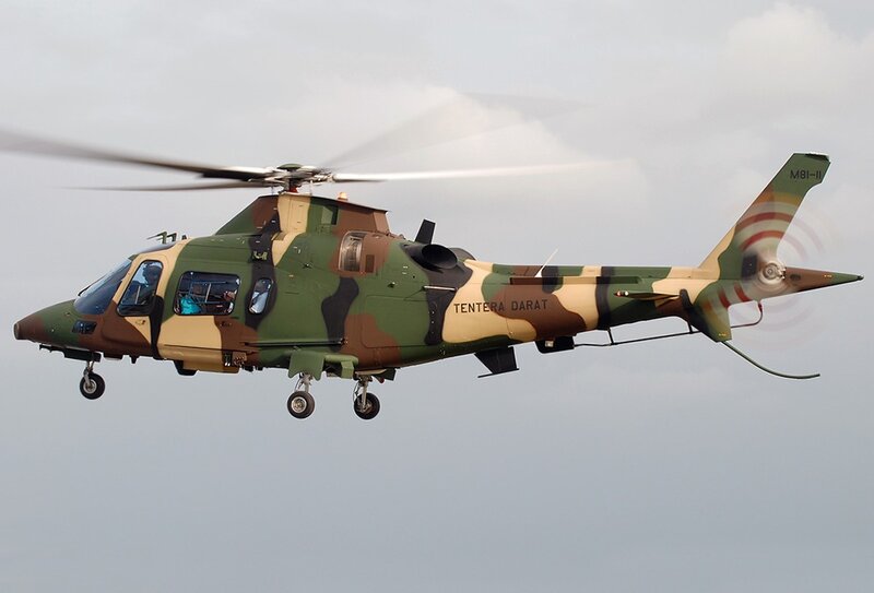 Military helicopter in flight