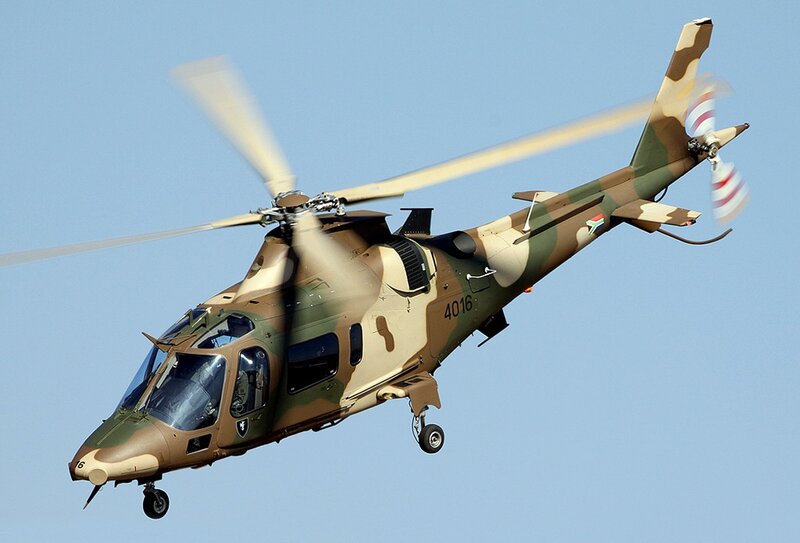 military helicopter in flight