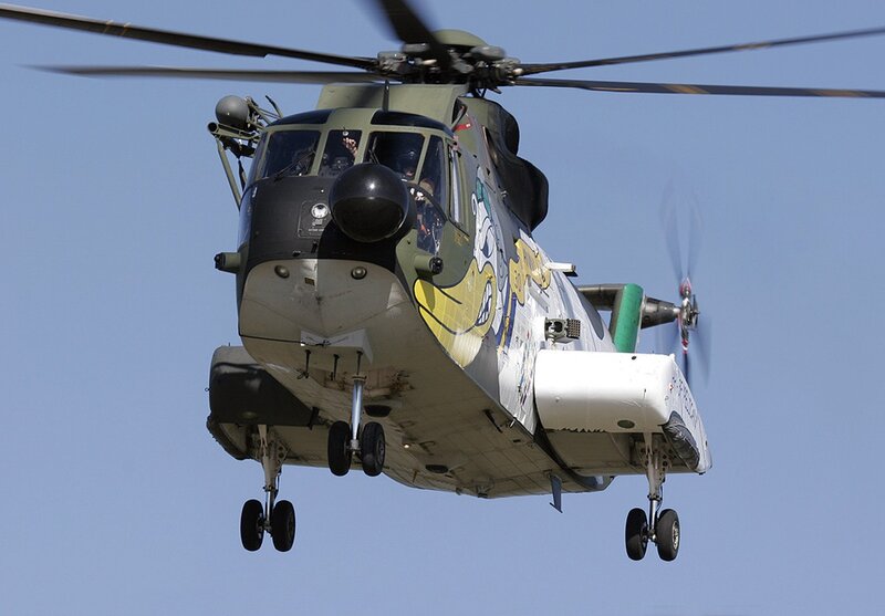 military helicopter in flight