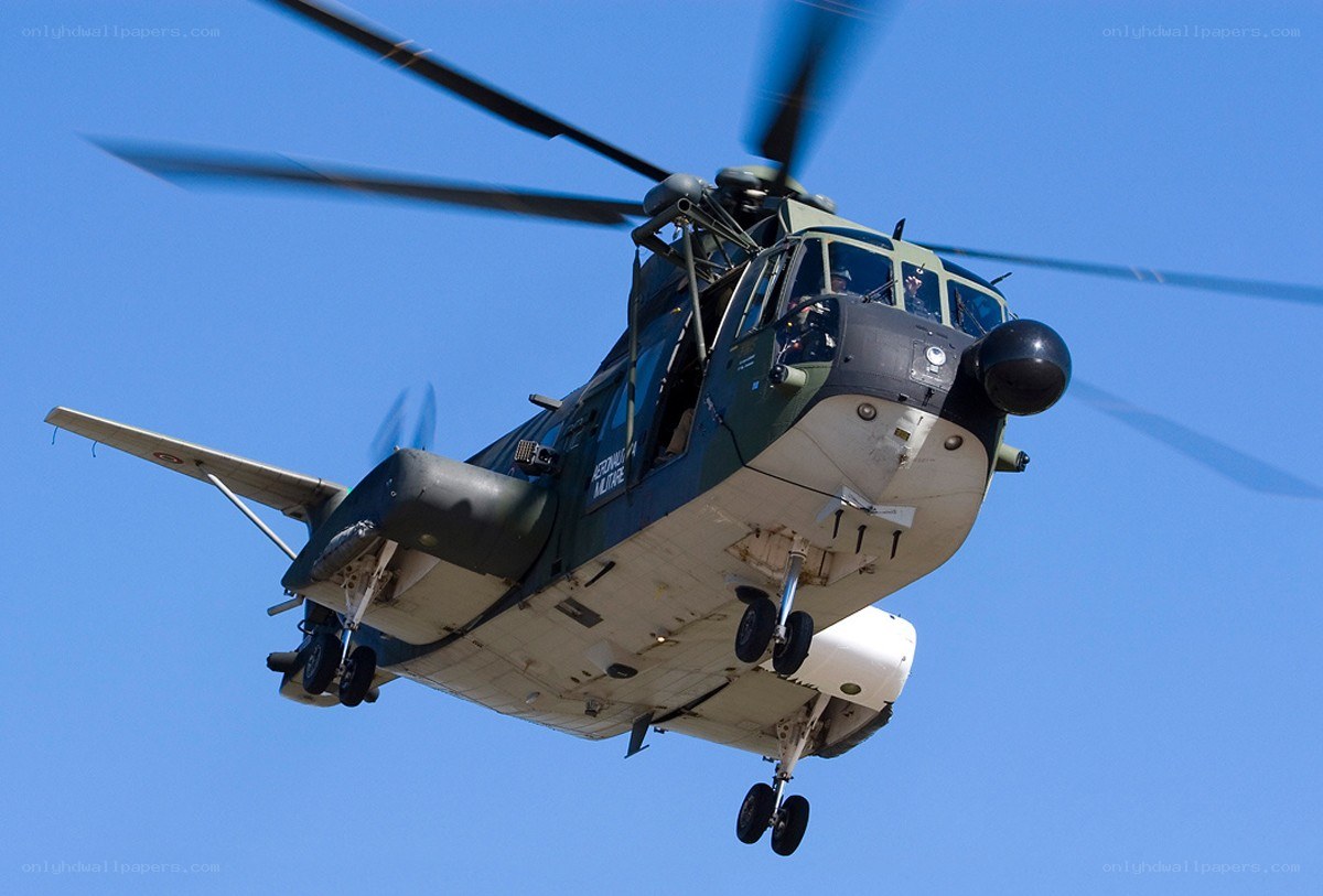 military helicopter in flight