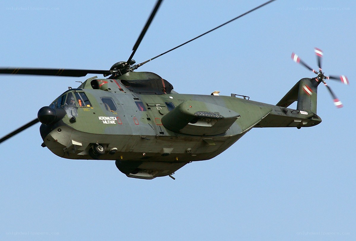 military helicopter in flight