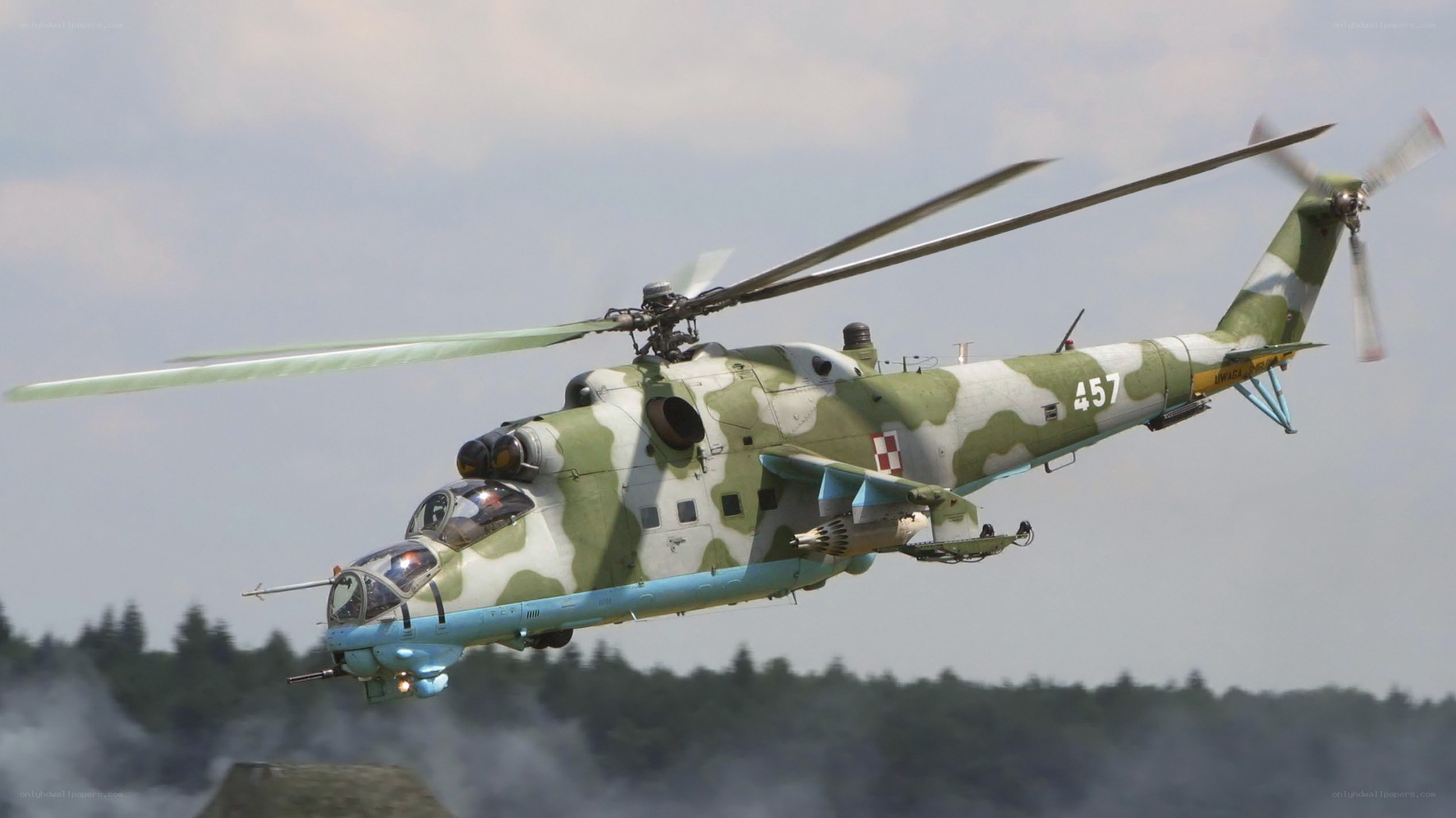 military helicopter in flight