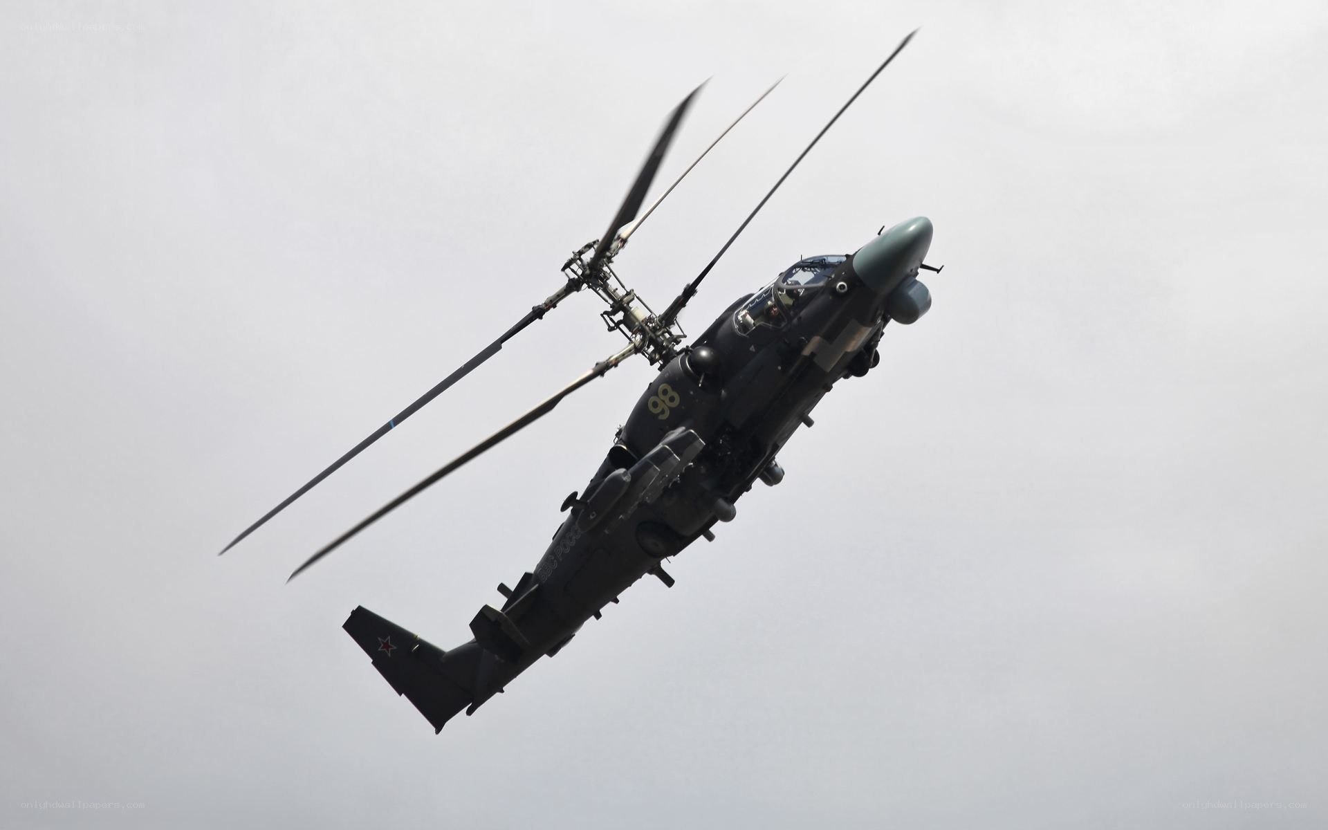 military helicopter in flight