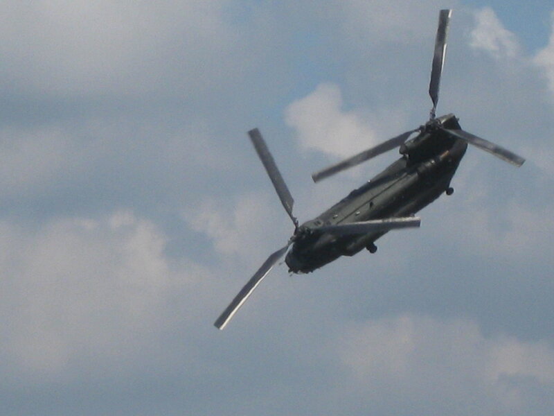 military helicopter in flight