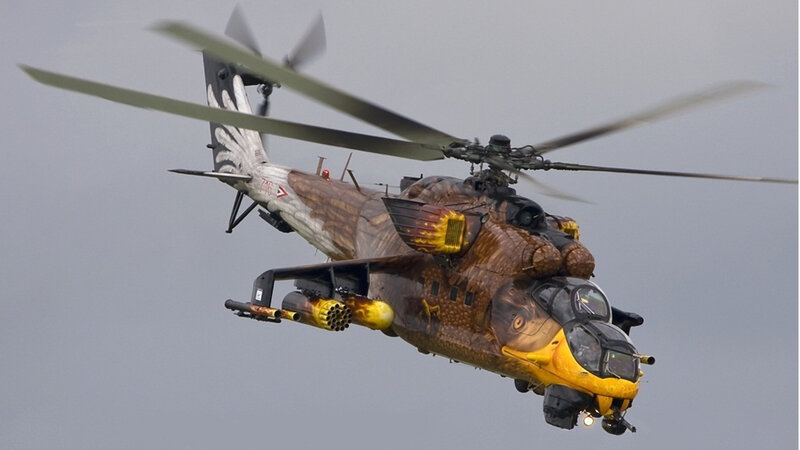 military helicopter in flight