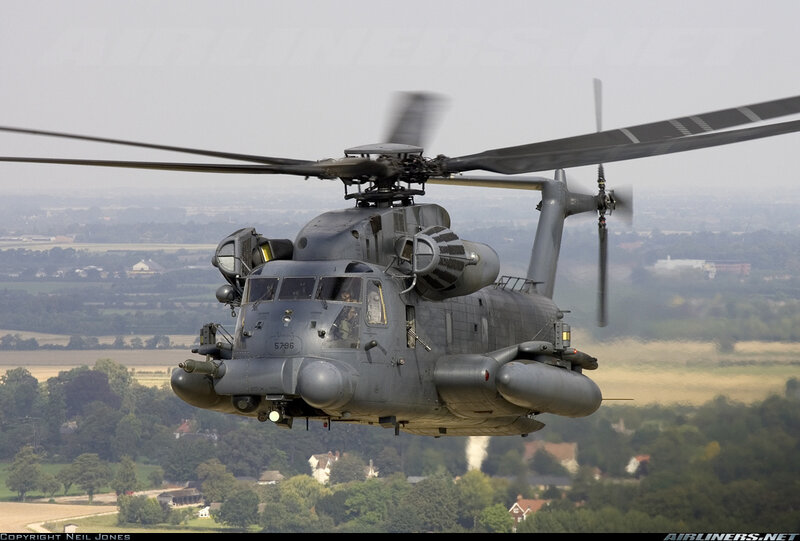 military helicopter in flight