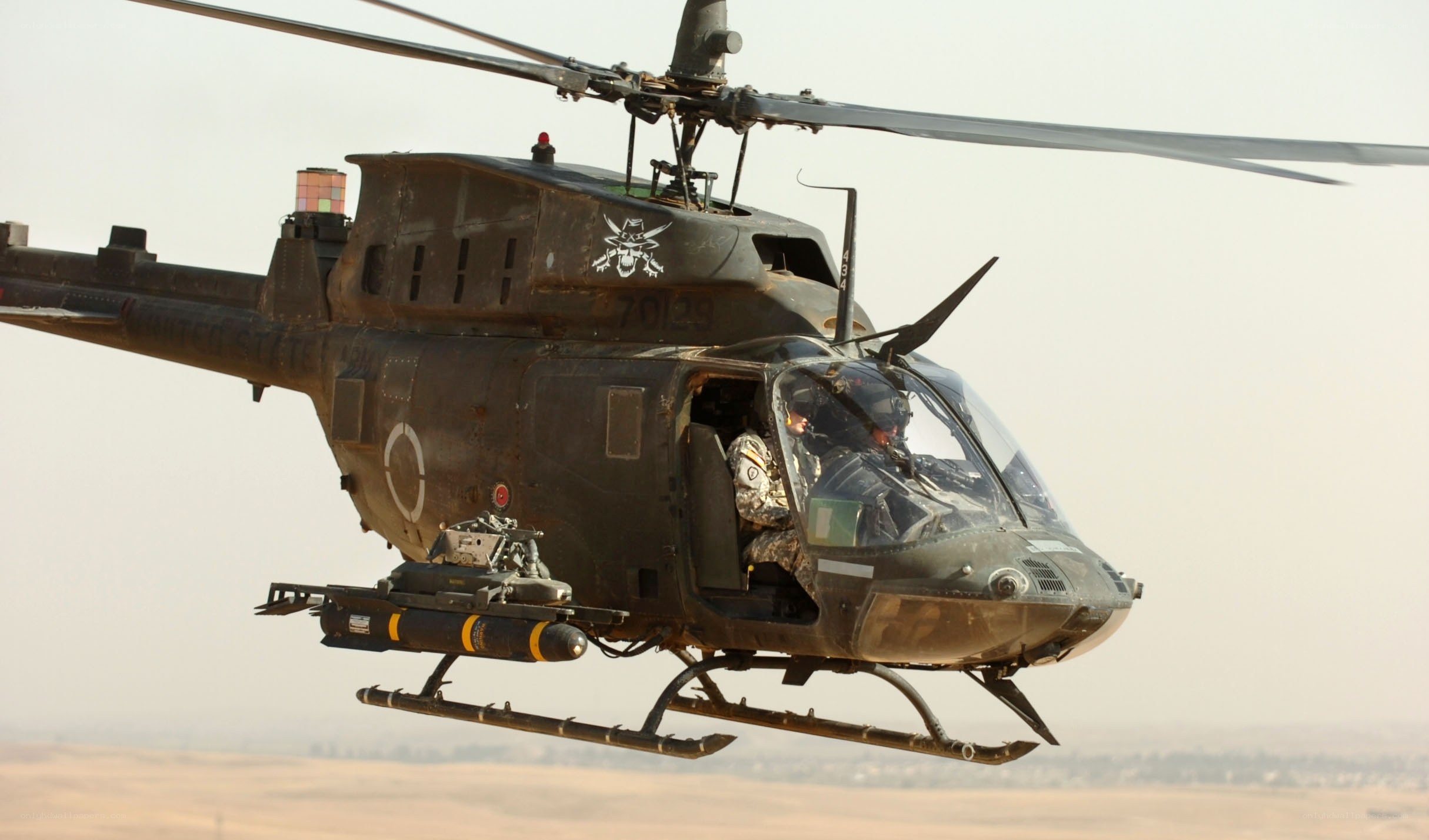 Military helicopter in flight