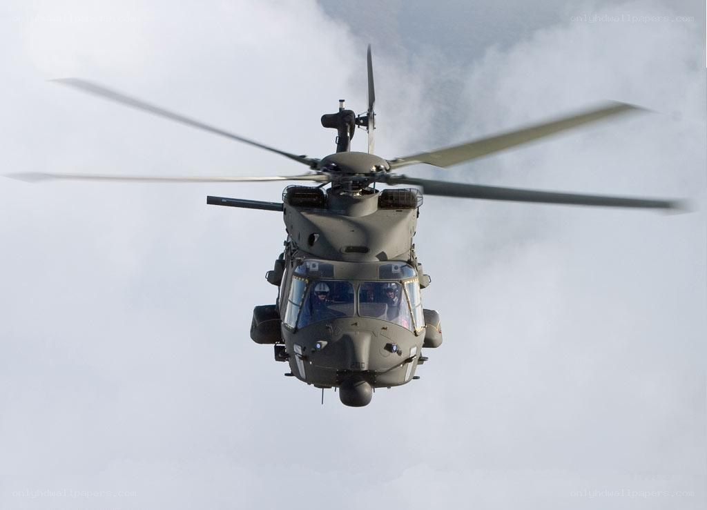 Military helicopter in flight