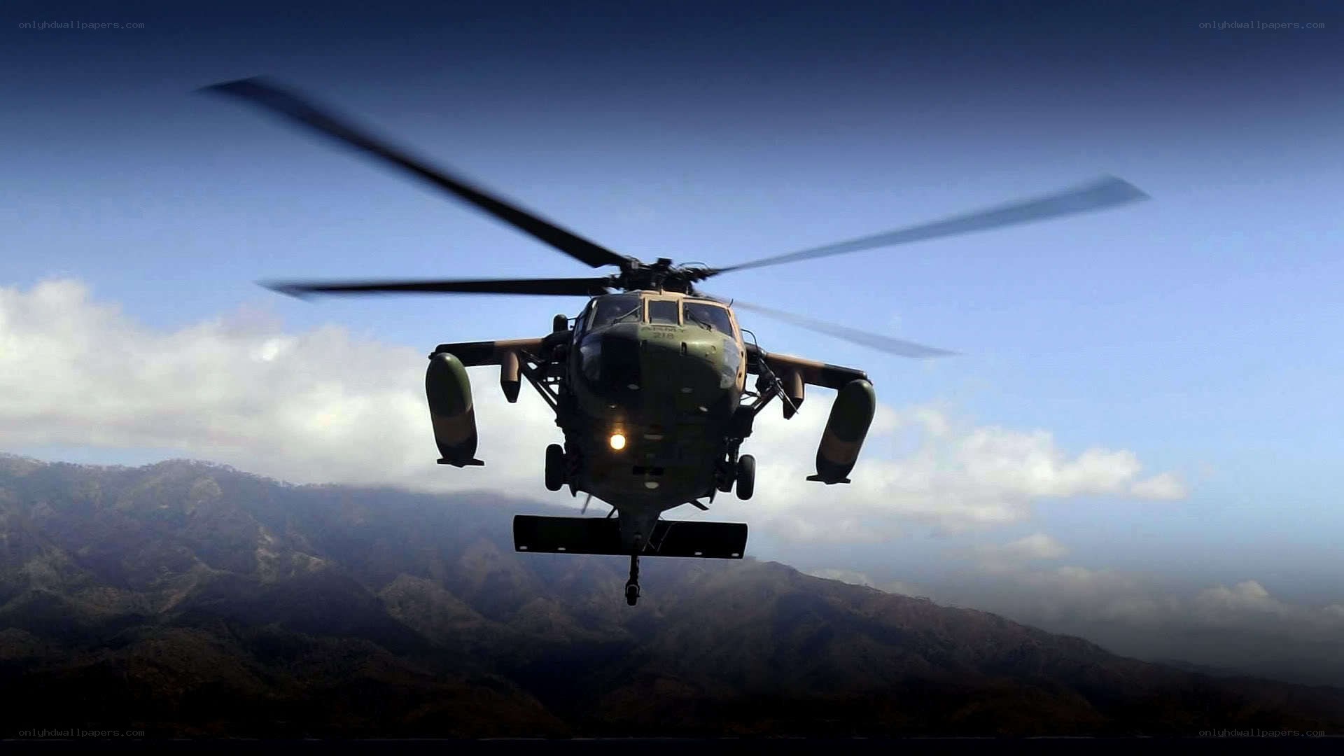 military helicopter in flight