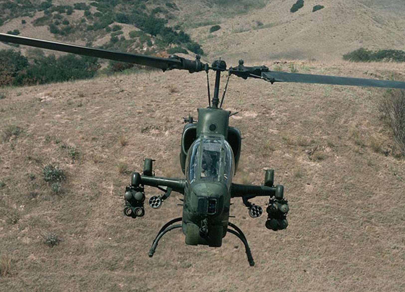 military helicopter in flight