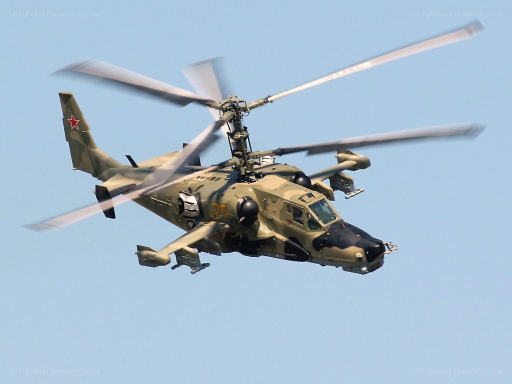 military helicopter in flight