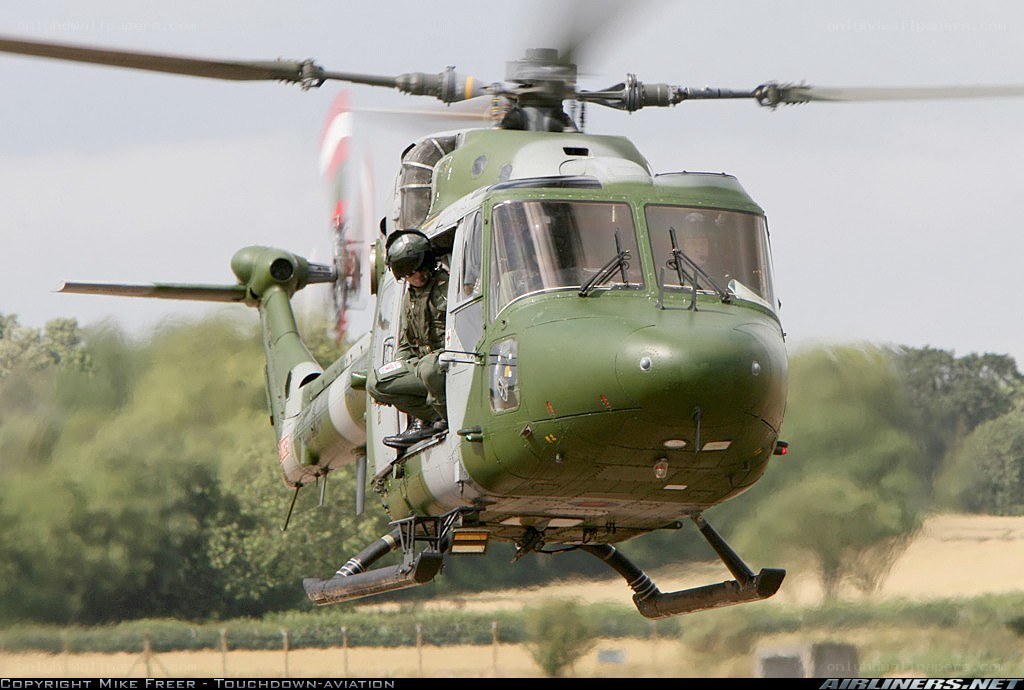 military helicopter in flight