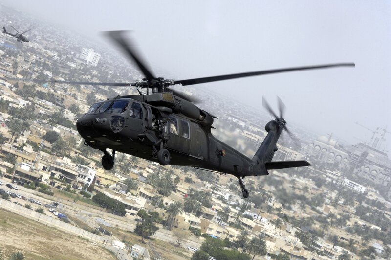 Military Helicopter in Flight — Black