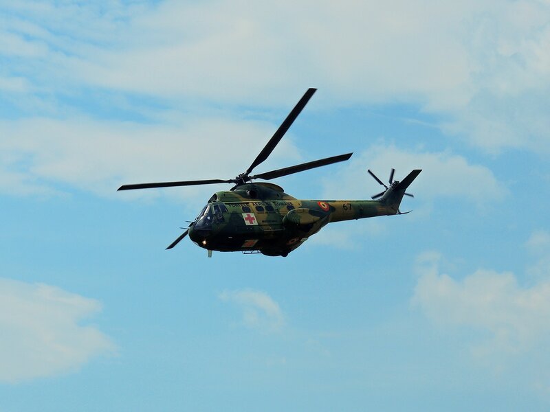 Military Helicopter in Flight — Blue, Calm, Afternoon, Photograph, Sky, Clouds