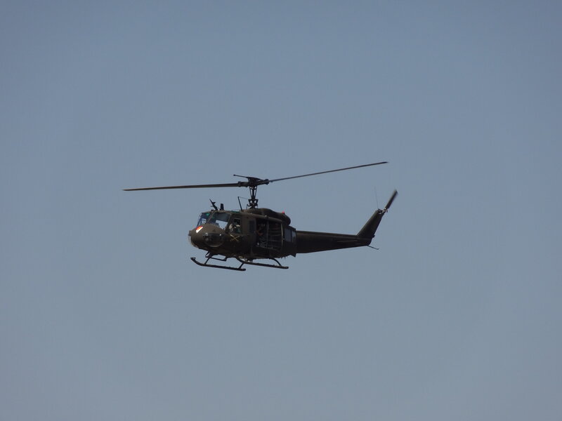 Military Helicopter in Flight — Blue, Calm, Afternoon